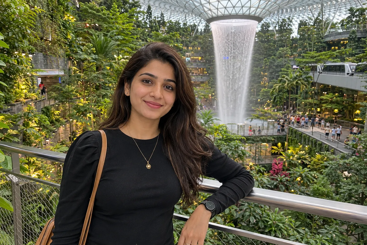 Smiling in a Lush Indoor Atrium
