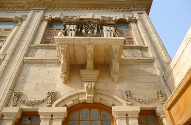 Façade of Mukhi House (Mukhi Mahal) with its balconies and tall windows, in the old city of Hyderabad, Sindh