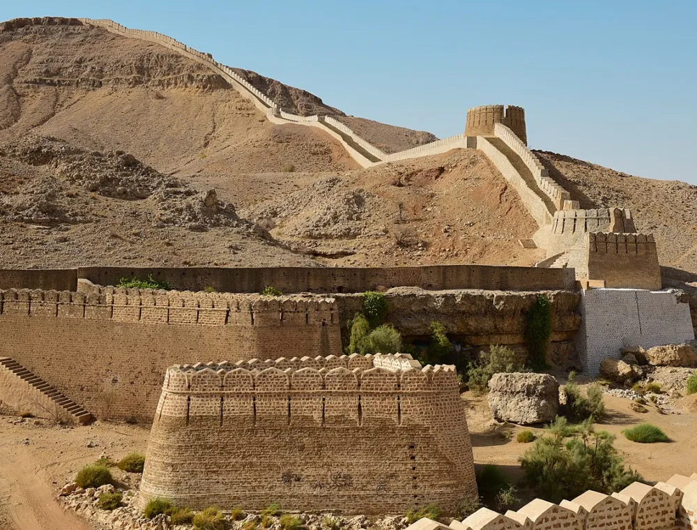 Stone walls and bastions of Ranikot Fort following the Kirthar hills