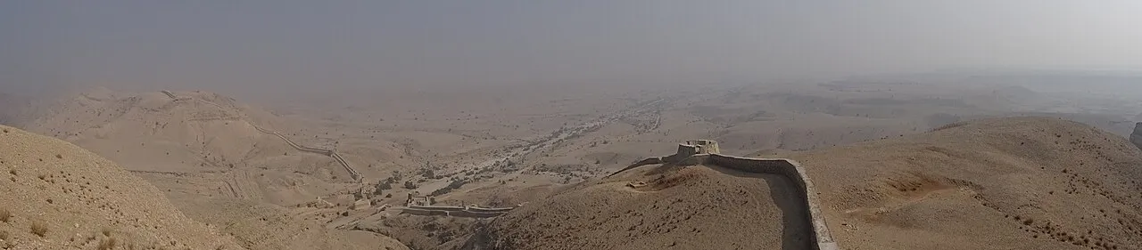 Panoramic view of Ranikot Fort walls across the hills of Jamshoro District