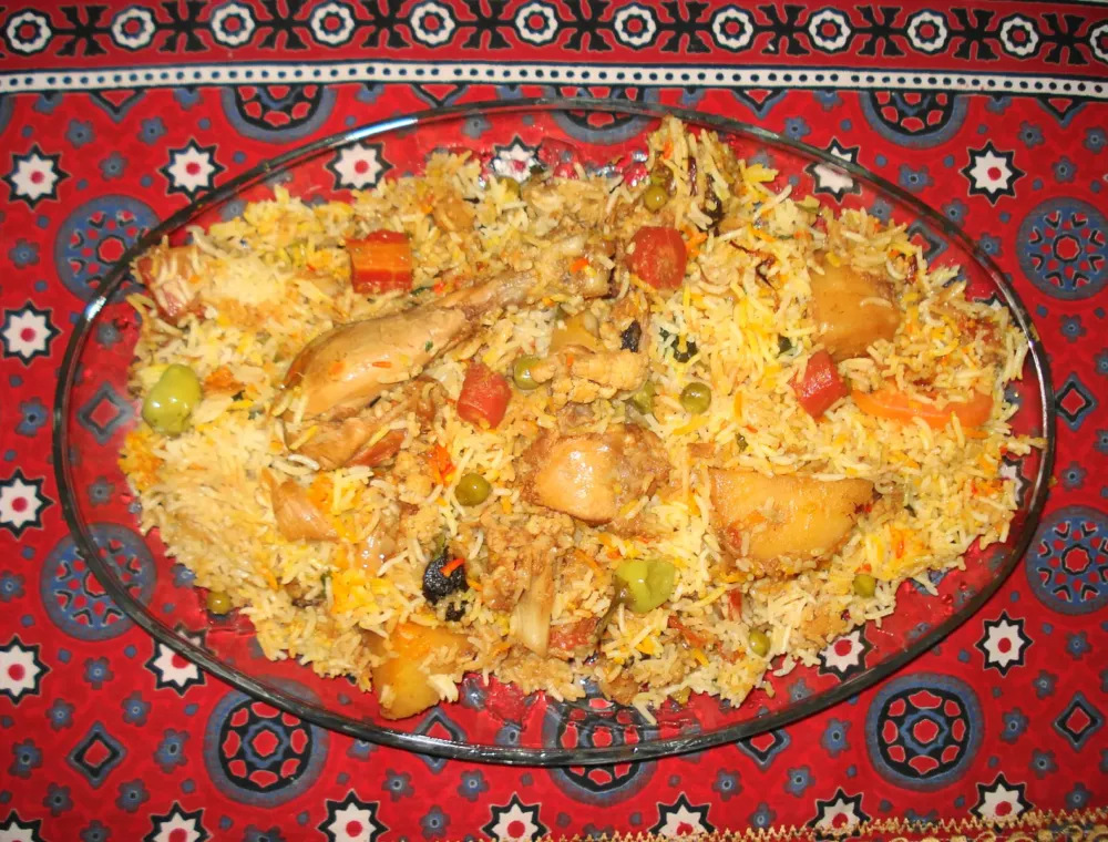 A plate of Sindhi biryani with spiced rice and masala