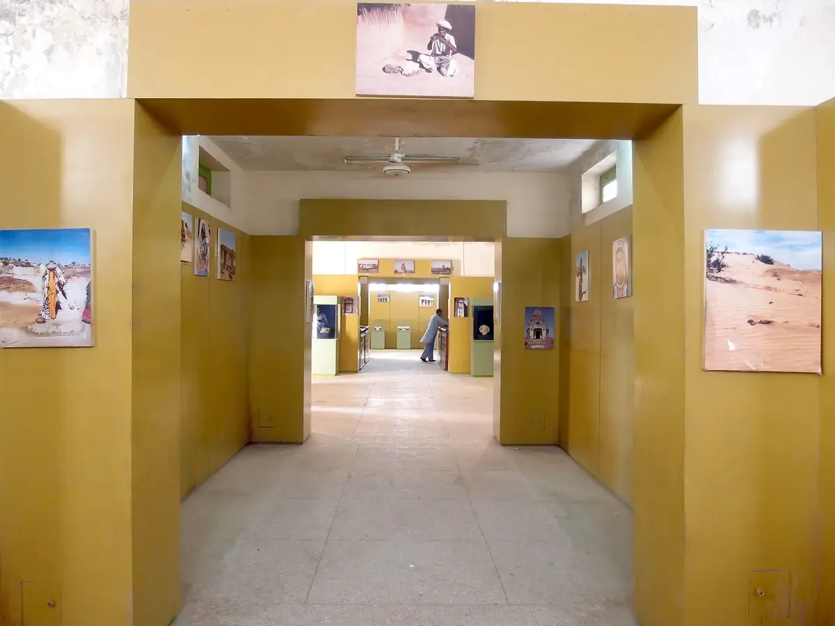 Display hall inside the Umerkot Fort museum with old weapons and artefacts